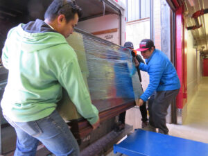 customers unloading items to be placed in a storage unit